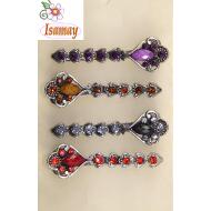 PINZA LATERAL BRONCE LAGRIMA FACETADA STRASS