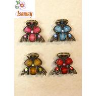 PINZA BRONCE TREBOL PIEDRAS GRANDES COLOR      