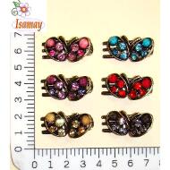 PINZA LATERAL BRONCE MARIPOSA STRASS Y PIEZAS FACETADAS COLOR